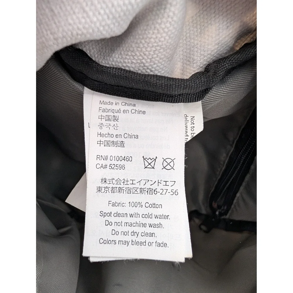 KAVU Rope Bag Geometric Triangle Print Canvas Sling Backpack Black Tan